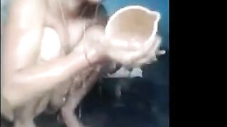 Indian milf bathing and showing her beautiful pussy