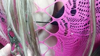 Susi is bouncing her tits. You see her in pink fishnet showing big muffin pussy