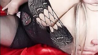 Susi is wearing black fishnet she is teasing with huge tits