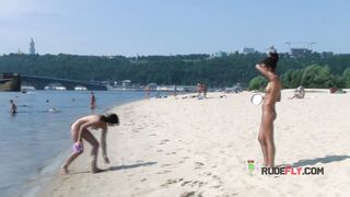 Bombastic young nudist babes sunbathe nude at the beach