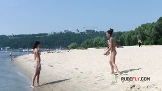 Bombastic young nudist babes sunbathe nude at the beach