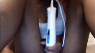 Vibrator on ebony pussy